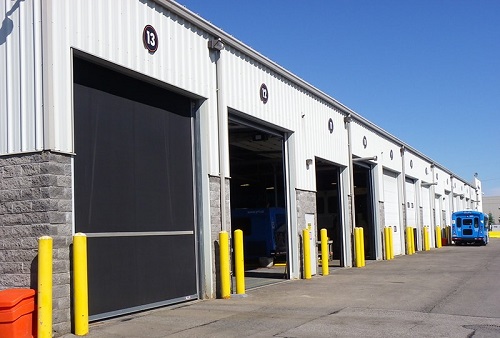 Warehouse Door Repair: 7 Signs You Should Fix the Door Before It Stops Your Shift