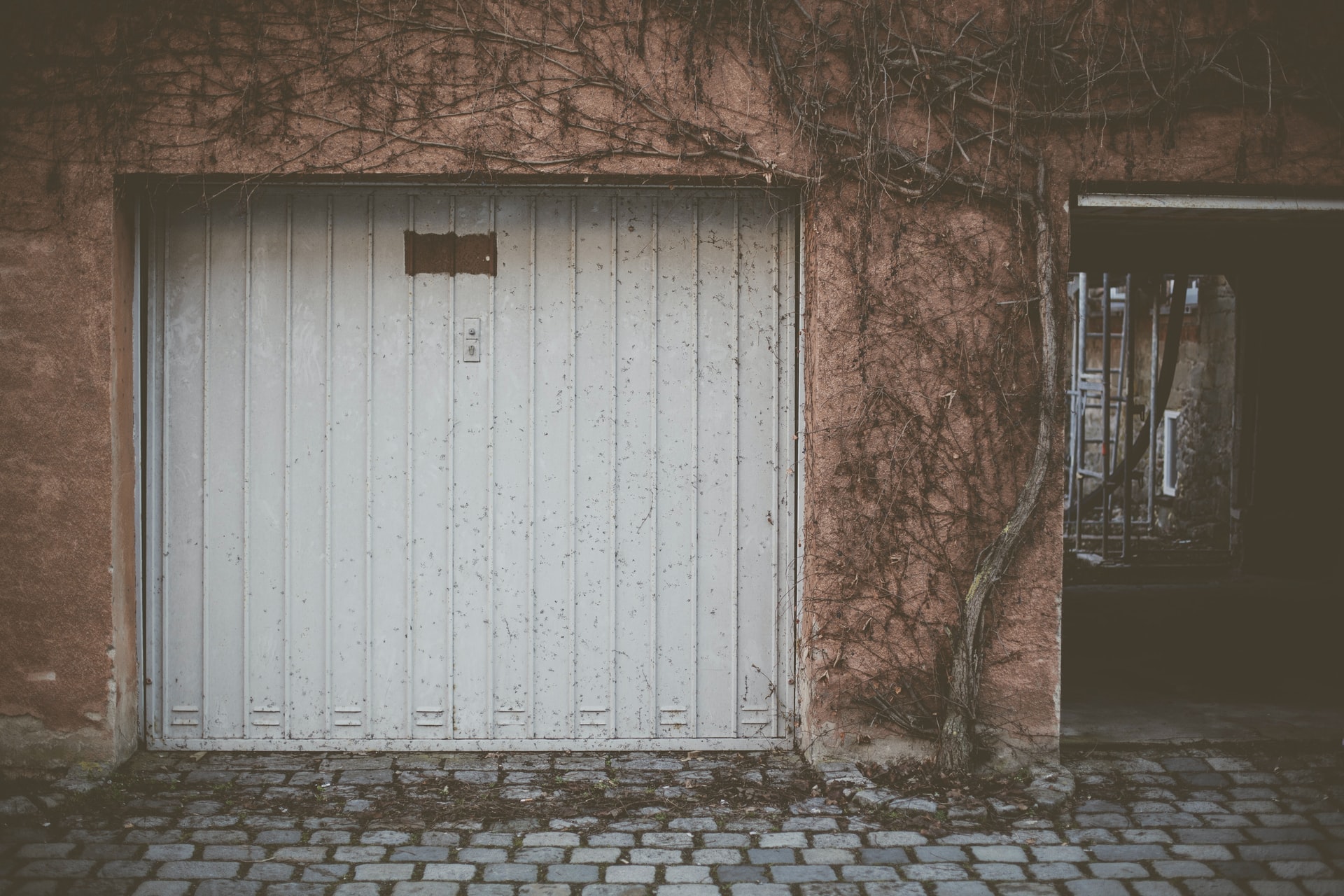 5 Reasons Your Garage Door Won’t Close image wolfgang-rottmann-ElCw9KwWyTw-unsplash 5 Reasons Your Garage Door Won’t Close